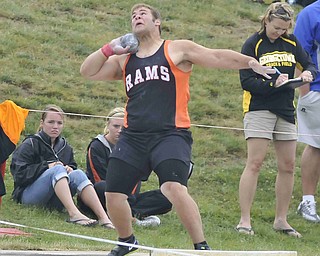 Jacob Chiclowe of Mineral Ridge throws the shot put Friday afternoon at the State Track Meet in Columbus.