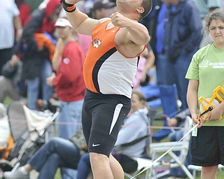 Stephen Lyons of Springfield throws the shot put Friday afternoon at the State Track Meet in Columbus.