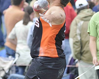 Jacob Chiclowe of Mineral Ridge throws the shot put Friday afternoon at the State Track Meet in Columbus.