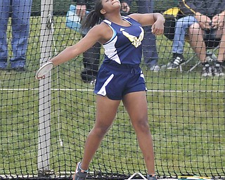 Jai'Lyn Mosley of McDonald throws the discus Friday afternoon at the State Track Meet in Columbus. She would finish second in divison three.