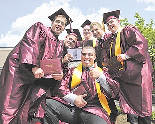 Graduating seniors from Boardman High School’s Class of 2012 take time to ham it up in the courtyard of the
high school after receiving their diplomas. The group includes, from left, Crawford Warrick, Brian Smith, Daniel
Watkins, Zachary Zidian, Dan Popio and Zach Machuga.