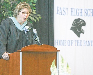 East High Principal Holly Seimetz speaks to graduates and their families during the East High School commencement Sunday.