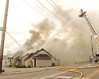 Austintown firefighters battled a blaze late Monday morning at the former Scacchetti’s Restaurant on Mahoning Avenue at Four Mile Run Road. When the fire started, workers were inside, cleaning up the building for a new
owner who planned to open a new restaurant there.