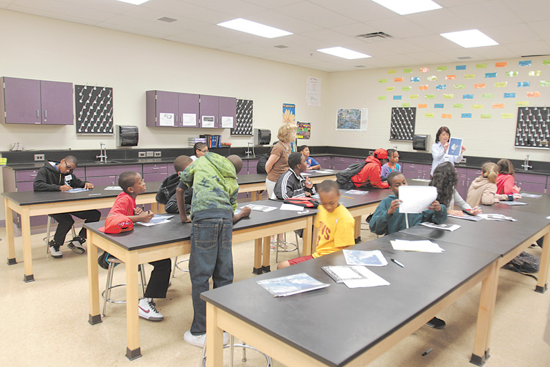 Chaney students in the Science, Technology, Engineering and Mathematics program participate in a summer-enrichment program at the school. In an exercise Wednesday, students looked for shapes in photographs of clouds.
