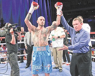Top Rank, March 31, 2012. While Kelly Pavlik has performed well in other cities — he improved to 1-0 in San Antonio after his knockout of Aaron Jaco in March, above — no city has done more for his career than Las Vegas, where he is 11-0 all-time. He’ll try to make it 12-0 when he faces Scott Sigmon tonight.