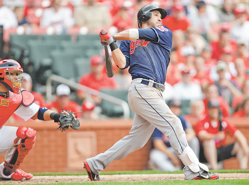 St. Louis Cardinals catcher Yadier Molina watches as the Cleveland Indians’ Jason Kipnis connects for a three-run homer in the ninth inning of Sunday’s baseball game in St. Louis. The Indians beat the Cardinals 4-1.