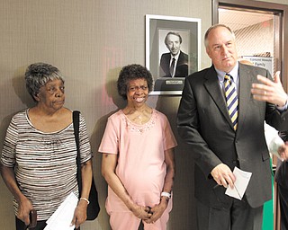Cora Rushton, left, and her daughter, Cora E. “Betty” Rushton were the centerpieces of a ceremony establishing the Dr. Edmund Massullo Cardio Vascular Intensive Care Family Waiting Room at St. Elizabeth Health Center’s CVIC unit. Monday marked the 50th anniversary of Betty Rushton’s open-heart operation when she was 2, on June 11, 1962. Dr. Massullo participated in the surgical procedure, which was the first of its kind in the Mahoning Valley. Also on hand for the dedication was Jim Schultis, right, president of Humility of Mary Health Partners Development Foundation.