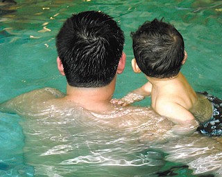 Mark Smith and his son Stephen, both of Boardman, enjoy swim lessons at the YMCA in Boardman. Photo sent in by Christina Smith.