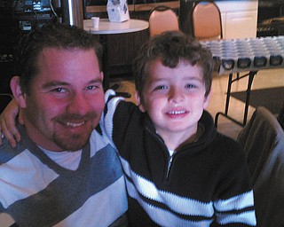 Randy Hovanec shares a moment with his son Dylan. Both are from North Jackson. Photo sent in by Kelly Hovanec.
