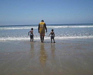 Mar Kirk of Youngstown sent in this photo and wrote, "Here is an attached photo of my grown son and his two young sons.'