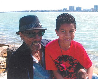 James Babb, left, of Detroit, hangs out at Belle Isle in Michigan on spring break of this year with Ryan Babb of Boardman.