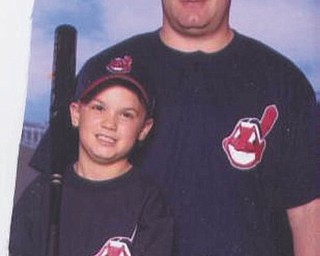 Joey Herubin and son Max, both of Canfield, show their Indians pride. Photo sent in by Bella Herubin.