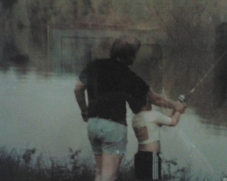Cheryl Smith of Canfield sent in this photo of a father and son's first fishing trip. Shown are James of Canfield and his son Jeffrey of Boardman.