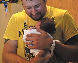 This photo was taken for the first Father's Day for this father and son. Curtis Tharp lovingly holds Joshua Eli Tharp, both of Columbiana. Photo sent in by Tawny Templin.