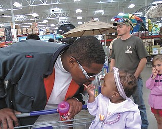 Fara C. Winlock has her father, Fred C. Winlock, wrapped around her little finger. They are from Youngstown.