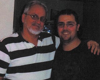 Robert Dripps of Lake Milton smiles with his dad, James Dripps of Girard.