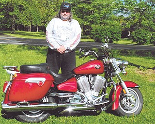 To raise money for accident victim Alissa Boyle, professional truck driver Earl Evans of Canfield, above, will attempt a 1,000-mile, 24-hour endurance motorcycle ride. M.E. Evans Trucking will pay all expenses for the ride, and 100 percent of the donations will go to Boyle. On Feb. 21 Boyle, of Salem, suffered a spinal cord injury, leaving her unable to walk. Sponsors may pledge by the mile or donate any set amount. The ride will begin in Canfield on a day in late June to be determined by the weather. Donations to Alissa Boyle Benefit can be made at any Farmer’s National Bank Branch.