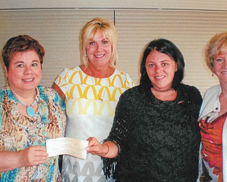The Mahoning County Medical Society Alliance presented a check for $4,000 to the Second Harvest Food Bank of Mahoning Valley BackPack program during a luncheon May 29 at the Upstairs Restaurant in Austintown. The proceeds came from the alliance’s Annual Charity Fashion show in February. The BackPack program is designed to meet the needs of hungry children at times when other resources are not available, such as weekends and school vacations. Backpacks are filled with child-friendly, nonperishable, easily consumed, vitamin-fortified food. Second Harvest Food Bank serves more than 375 children in the program. To host a food drive call 330-792-5522. From left are Paula Jakubek, immediate past president of the alliance; Michele Duffett, president; and Becky Miller and Shirley Matula of Second Harvest.