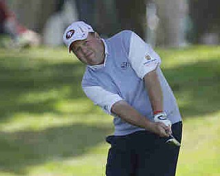 Dennis Miller hits out of the rough on the first hole during the first round of the U.S. Open Championship golf tournament Thursday, June 14, 2012, at The Olympic Club in San Francisco. (AP Photo/Ben Margot)