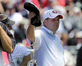 Dennis Miller gets his driver during the first round of the U.S. Open Championship golf tournament Thursday, June 14, 2012, at The Olympic Club in San Francisco. (AP Photo/Eric Gay)