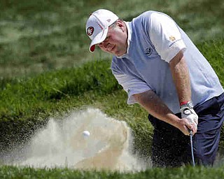 Dennis Miller hits out of a bunker during the first round of the U.S. Open Championship golf tournament Thursday, June 14, 2012, at The Olympic Club in San Francisco. (AP Photo/Eric Gay)
