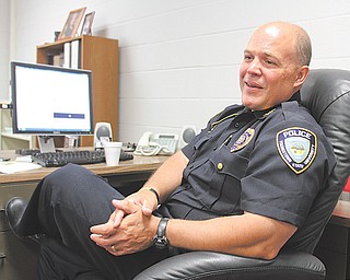 John Beshara, who was appointed Youngstown State University police chief last February, talks about some of
his ideas for the university police force. Beshara, 44, a cancer survivor, plans to begin a police bicycle unit at
YSU within the next few weeks.
