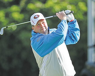 Youngstown’s Dennis Miller watches his shot during Round 2 of the U.S. Open on Friday at The Olympic Club in San Francisco. Miller, who is golf director at Mill Creek, missed the cut after finishing 12 over for the day and 22 over for the tournament.