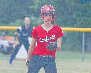 Canfield’s Gina Mancini leads off of second base during Monday’s Mahoning-Trumbull All-Star games at
Candlelite Knolls in Bazetta Township. In the second game, Mancini was one of three players to catch for both
teams.