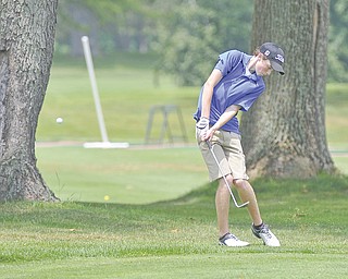 Matt Peck chips out of the rough outside the fairway during the third qualifier for The Greatest Junior Golfer of the Valley tournament Monday at Salem Golf Club in Salem. The top two golfers in each division — boys U-17, girls U-17 and boys U-14 — advanced to the championship set for July 21 at Trumbull County Club.