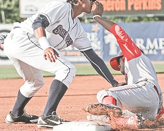 Scrappers third baseman Erik Gonzalez tags out Crosscutters baserunner Chace Numata to complete a fielder’s choice in the first inning of Tuesday’s game at Eastwood Field. The Scrappers won 6-2.
