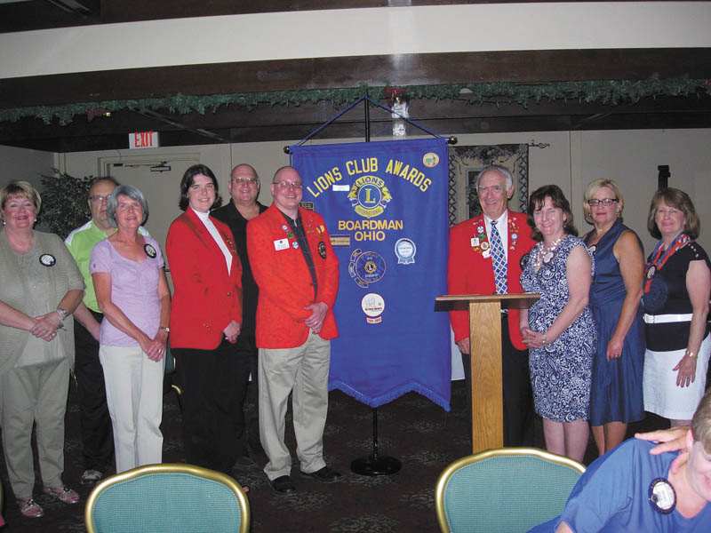 Boardman Lions Club members recently installed a slate of officers for the 2012-2013 season. Accepting the responsibility of their offices were, from left, Terri Wilkes, secretary; John Landers, treasurer; Judy Jones, director; Jaclyn Rausch, director, Ron Paris, first vice president; Bill Rausch, third vice president and tail twister; John Woodside, district governor-elect; Mary Shobel, lion tamer; Laura Hancock, membership; and Patti Shears, director. Also seated but not pictured were Terry Shears, king lion, and Kris Dailey, director.