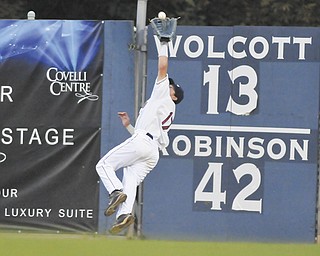 Scrappers right fielder Hunter Jones goes airborne to make a catch and prevent a State College rally during the top of the seventh inning of Thursday’s game at Eastwood Field.