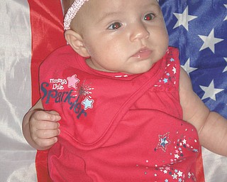 This photo came from Richard Frondorf, captioned as a "picture of my 4-month-old daughter [Gabriella Frondorf]." It was taken in 2011 on her first July 4th.