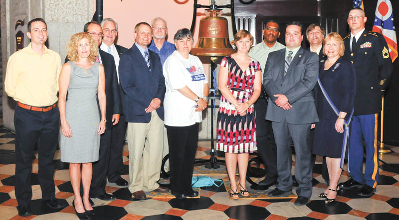 June 18 marked the 200th anniversary of the start of The War of 1812. To recognize the day, Ohio War of 1812 Bicentennial Commission members met at the Ohio Statehouse in Columbus for a commemorative ceremony. Columbiana County recorder Craig Brown, second from right, front, is pictured with other commission members.