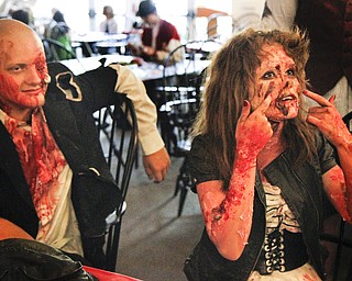 MADELYN P. HASTINGS..At the 'Zombie Prom' in Poland, Ohio, Austin Bayer, 17, and Breanna Keever, 17, of Boardman, Ohio show off their extreme zombie makeup. They both put in a great amount of time and effort for the Zombie Prom on June 28, 2012.