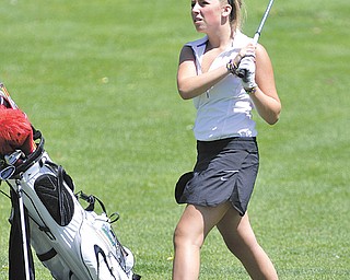 Gina Cerimele watches her chip shot on the 10th hole at Diamond Back Golf Course in Canfield during Monday’s girls qualifier for The Greatest Junior Golfer of the Valley golf tournament. Cerimele was among the four golfers to advance to the finals July 21 at Trumbull County Club.