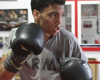 William d Lewis The Vindicator Boxer Popo Salinas works out with trainer Jack Loew at Southside Boxing Club 7-3-12.