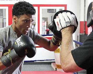 William d Lewis The Vindicator Boxer Popo Salinas works out with trainer Jack Loew at Southside Boxing Club 7-3-12.