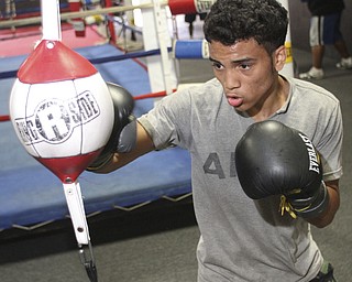 William d Lewis The Vindicator Boxer Popo Salinas works out with trainer Jack Loew at Southside Boxing Club 7-3-12.