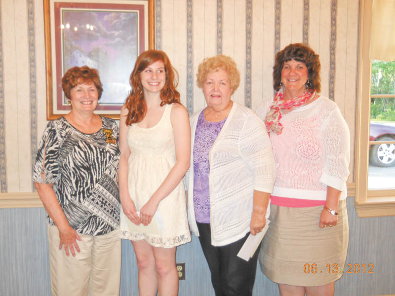 The Tri-Gold Chapter of the American Business Women’s Association met June 13 at A La Cart Catering in Canfield and awarded scholarships to Cassandra Clyde of Struthers, who is a senior forensic science major at Mercyhurst College in Erie., Pa., and to Dena Tufaro of Liberty, who is a sophomore at Slippery Rock University majoring in therapeutic recreation. From left to right are Sharon Pasquale, president of Tri-Gold Chapter; Clyde; Sarah Janutolo, the chapter’s professional development chairwoman; and Mary Clyde, mother of Cassandra Clyde. Tufaro is absent from the picture.