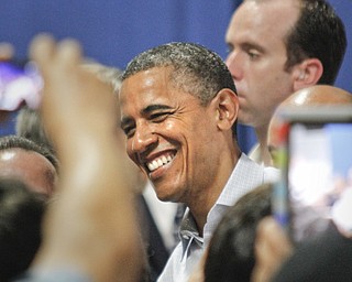 MADELYN P. HASTINGS | THE VINDICATOR..President Barack Obama after his speech at Dobbins Elementary School in Poland, Ohio on July 6, 2012. He poses for many pictures with supporters. ... - -30-..