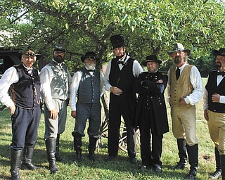 Civil War reenactors who will participate in the 105th Ohio Volunteer Infantry’s reenactment July 21 and 22 are, from left, Don VanMeter, as a major; Mike Lawson, as General Stonewall Jackson; Ed Beers, as General Robert E. Lee; Jerry Payne, as President Abraham Lincoln; Chris Gunvalsen, as General William Tecumseh Sherman; Ron Johnson, as General Nathan Forest; and Tim Perry, as a colonel.