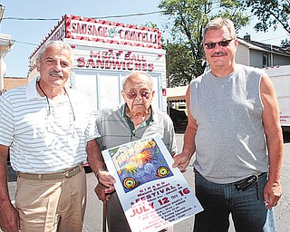 From left, Myron Esposito, Girard Mount Carmel society co-chairman, Fred Ragozzine, and Ray Ragozzine, chairman of the Girard Mount Carmel Society, stand outside the Italian Fraternal Home in Girard, the location of this year’s Mount Carmel festival.