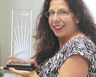 Charlotte, Diss, senior director of the local American Heart Association, was awarded the association's top honor, the Rome Betts Award, for her dedication to AHA's mission of building healthier lives free from cardiovascular disease and stroke.