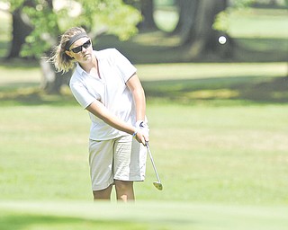 Kaylee Neumeister chips out of the short rough and onto the green on the 15th hole at Friday’s Greatest Junior Golfer qualifier at Tamer Win in Cortland. Neumeister won the 12-14-year-old age group.
