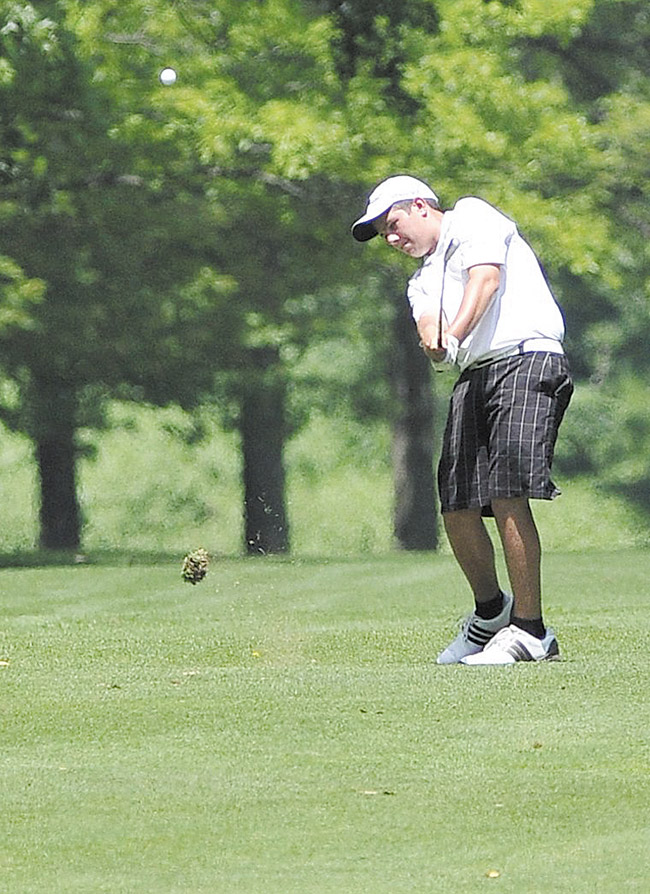 Donavon Ray follows through on his swing from the fairway on the on the 14th hole at Tamer Win in Cortland at Monday’s Greatest Junior Golfer of the Valley qualifier. Ray’s 80 placed second and secured a qualifying spot for Saturday’s 12-14-year-old finals.
