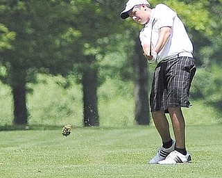 Donavon Ray follows through on his swing from the fairway on the on the 14th hole at Tamer Win in Cortland at Monday’s Greatest Junior Golfer of the Valley qualifier. Ray’s 80 placed second and secured a qualifying spot for Saturday’s 12-14-year-old finals.
