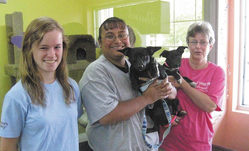 The Humane Society of Columbiana County plans to celebrate summer with a Pet Lovers Ice Cream Social from 11 a.m. to 3 p.m. Thursday, Friday and Saturday at Bo’s Pet Shoppe, 14883 South Ave., Columbiana. Pets are welcome along with their owners to participate in contests, sales and giveaways. Raffle tickets will be given to those to take shelter supplies such as clay kitty litter, laundry detergent, latex gloves, towels or bedding, garbage bags and gift cards. Posing with Pets Photography will be on hand from 11 a.m. to 2 p.m. Friday and Saturday to photograph you and your pet for a nominal fee. Blackwood and Best Breed Pet Food representatives will answer questions about pet nutrition. Ohio Pet Foods of Lisbon, produces both brands. The Humane Society will have adoptable pets and T-shirts available. All proceeds will benefit the Humane Society of Columbiana County. For information call Bo’s at 330-482-1003 or HSCC at 330-332-2600. From left to right are Megan Douglas, a staff member at Bo’s; Stephanie Peterson, an HSCC humane agent; Pip, a Humane Society alumnus; and Mary Algaier, the owner of Bo’s, with Lacey, who is up for adoption.