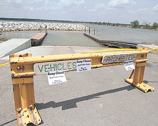 The state boat launch ramp into Mosquito Lake off the state Route 88 causeway, where the water depth is 2 feet and falling, was closed indefinitely Tuesday due to the drought-reduced water level.
