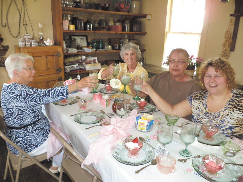 The first tea at the Barnhisel House is commemorated by guests, from left, Marcena Dilley, Betty Linville, Nancy Patterson and Michelle Mazzella. The Barnhisel House, operated by Girard Historical Society, is located on Youngstown-Warren Road (Route 422) in Girard. It is open from 1 to 4 p.m. the second and fourth Sundays of the month. An exhibit of antique tools is currently featured. Donations are accepted. Visitors may buy calendars and postcards. Memberships are available by calling 330-545-6559 or 330-545-6162. Visit www.girardhistoricalsociety.org.